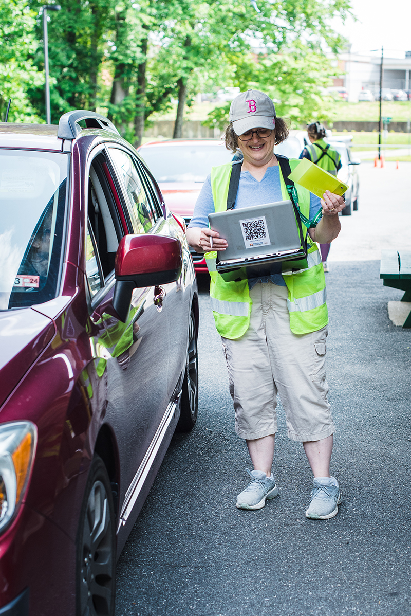 Volunteer at car